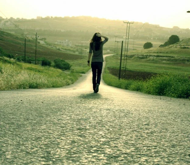 Alone Sad Girls Walking on Road